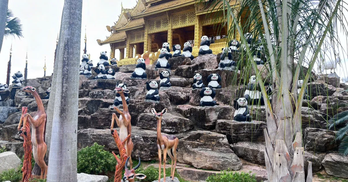 This photograph shows the gardens and tropical landscape of Nong Nooch Tropical Botanical Garden in Chonburi Province, Thailand.